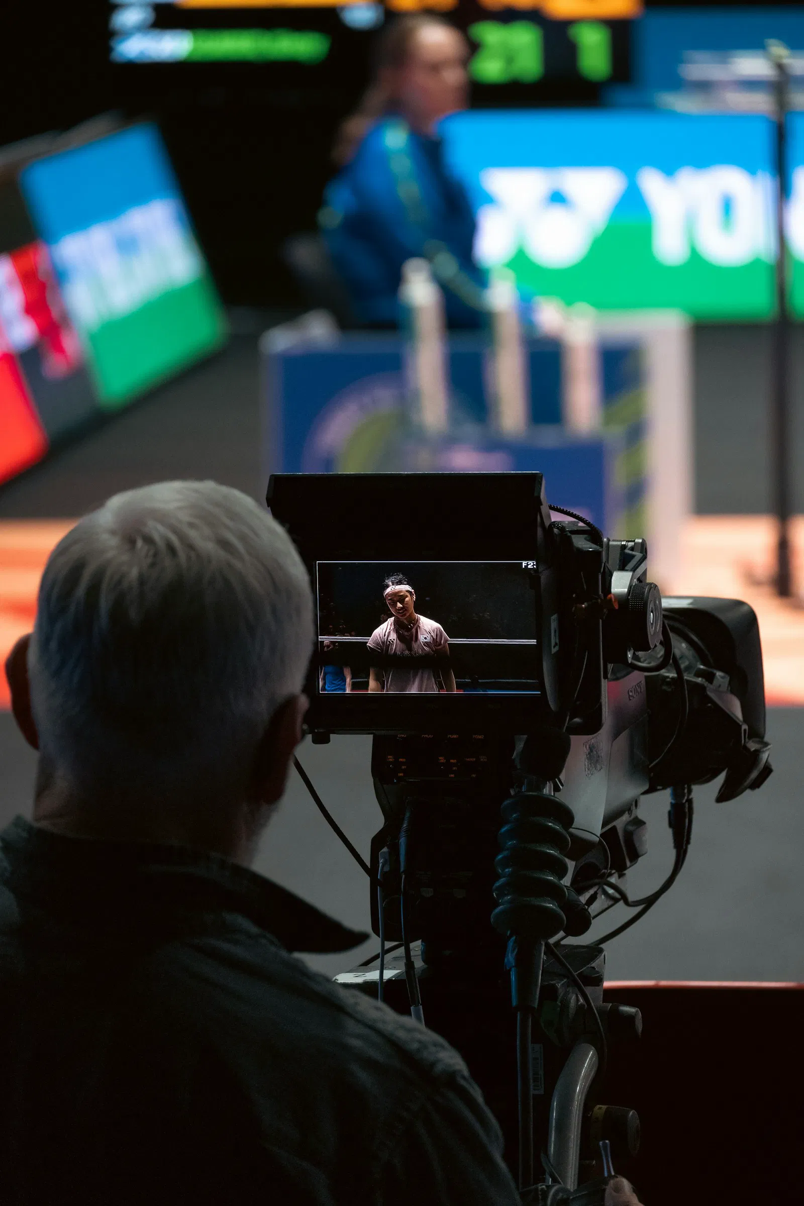 Camera operator filming a sports interview